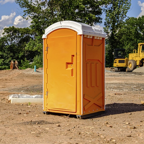 what is the cost difference between standard and deluxe portable toilet rentals in Nora